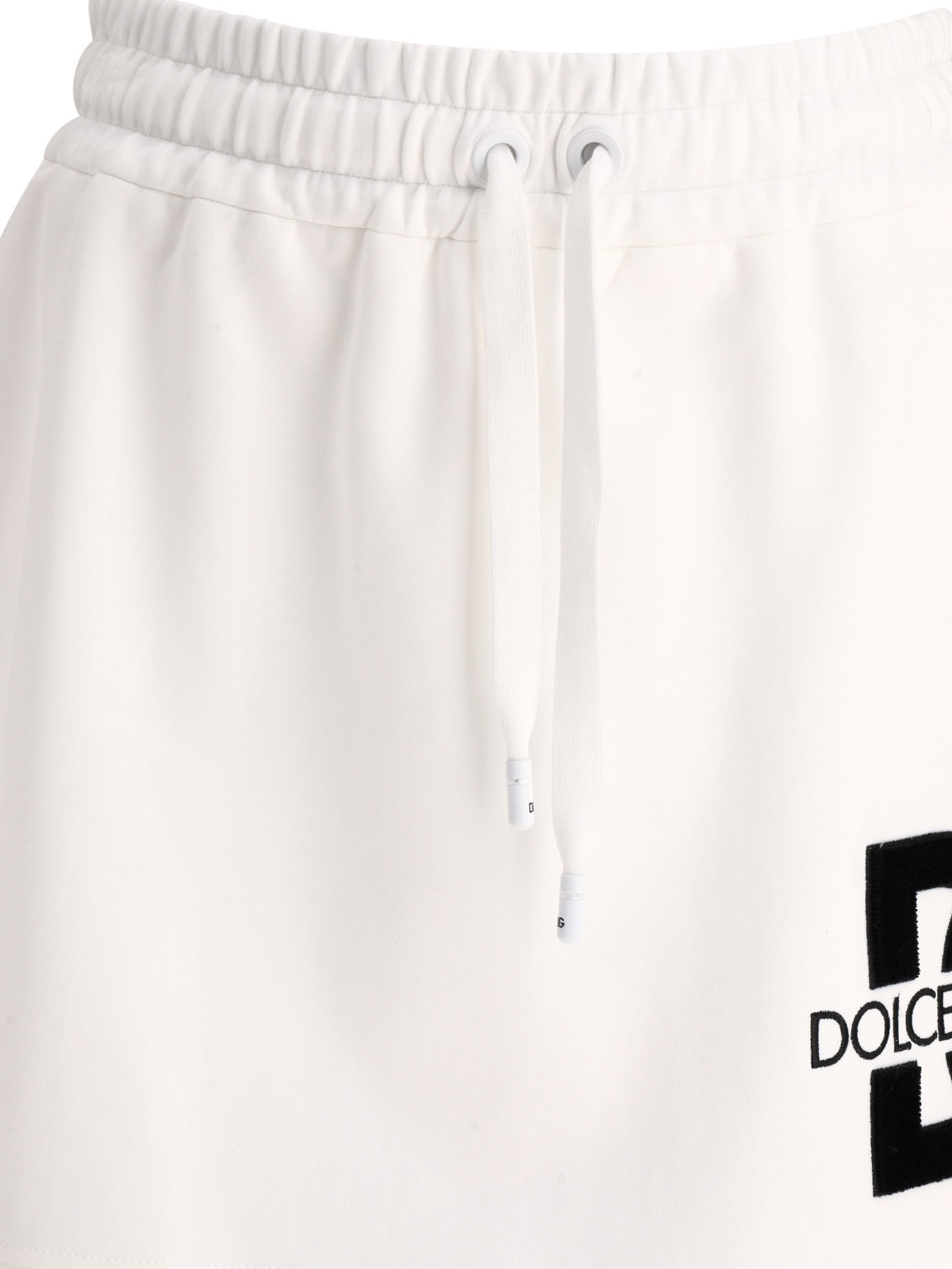 DOLCE & GABBANA Jersey miniskirt with DG logo patch